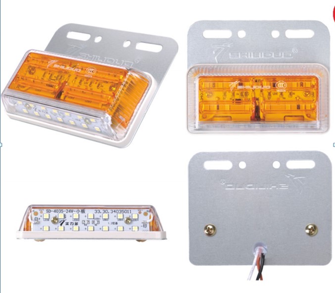 FAROL LATERAL AMBAR C/SOPORTE Y LUZ VIGIA HACIA ABAJO 24V                                                                                             